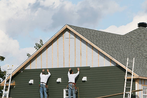 Professional Siding Contractor technician working in Terrell, TX